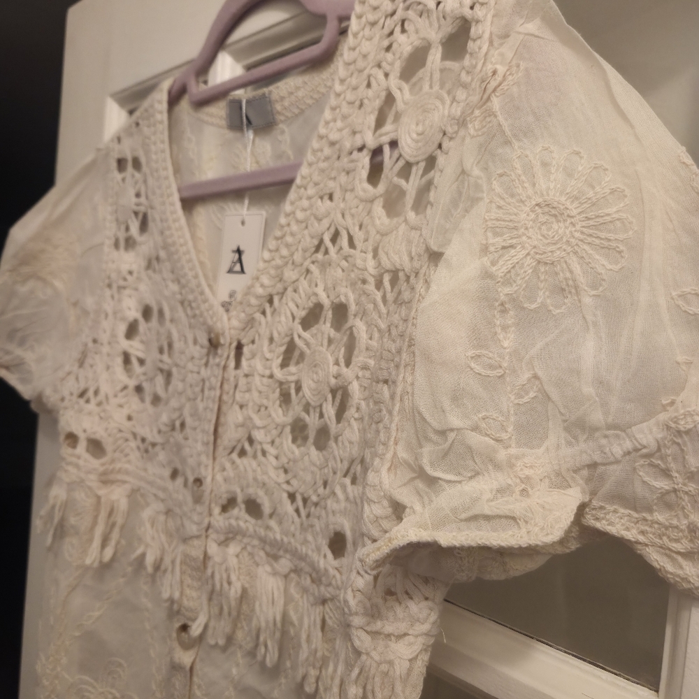 AZ Elegant Crochet Lace Blouse in Cream With Ruffled Sleeves & Fringe - Picture 5 of 10